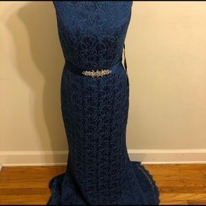 New blue party dress. Fit like 6 even thou is 8.